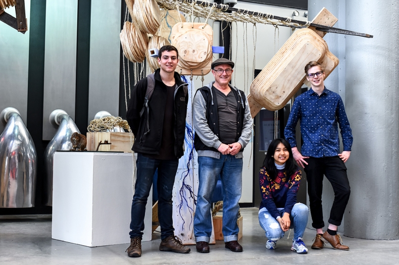 Students Luis Quintas da Fonseca, Malcolm Liehr, May Thet Khine and Isaac Alford in front of their species hotel.