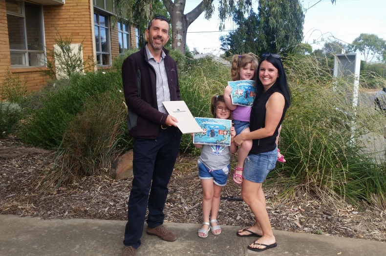 Lisa-Marie Sandery receiving her prize from Greening Australia