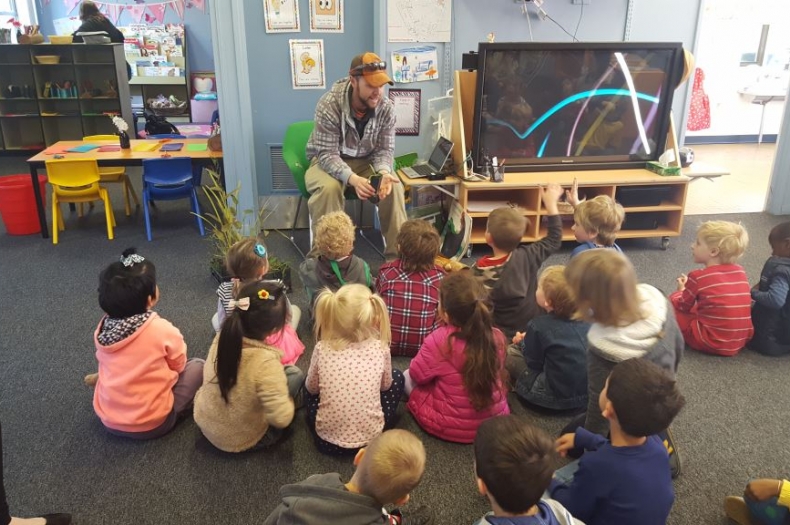 Adam teaching Merribyrnong preprimary school about Indigenous culture and bushtucker.