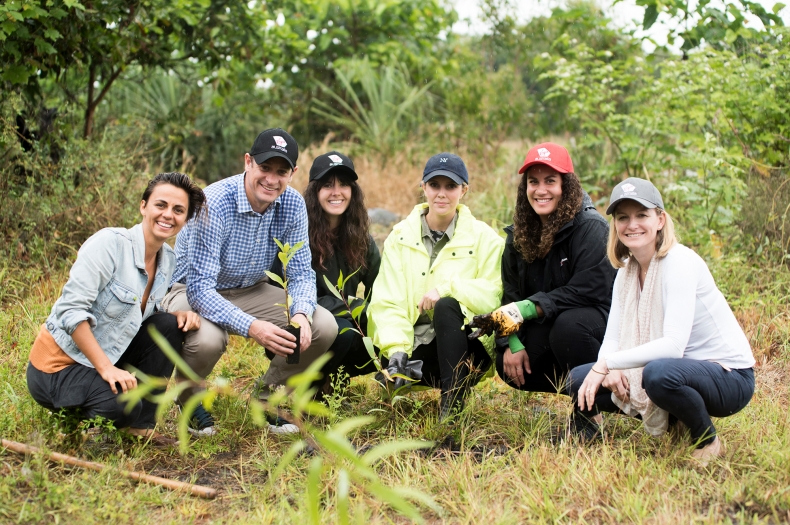 The Virgin Australia team including Head of Sustainability, Robert Wood and Chief Legal and Risk Officer, Dayna Field, leaving their green footprint on Mungalla Station. Copyright Annette Ruzicka