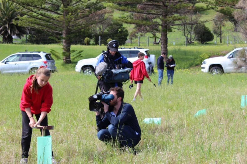 Rapid Bay Primary School kids tree planting whilst being filmed by the Totally Wild crew (source: Serina Lattanzio, Greening Australia).