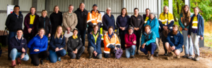 A posed group photo of workshop attendees.