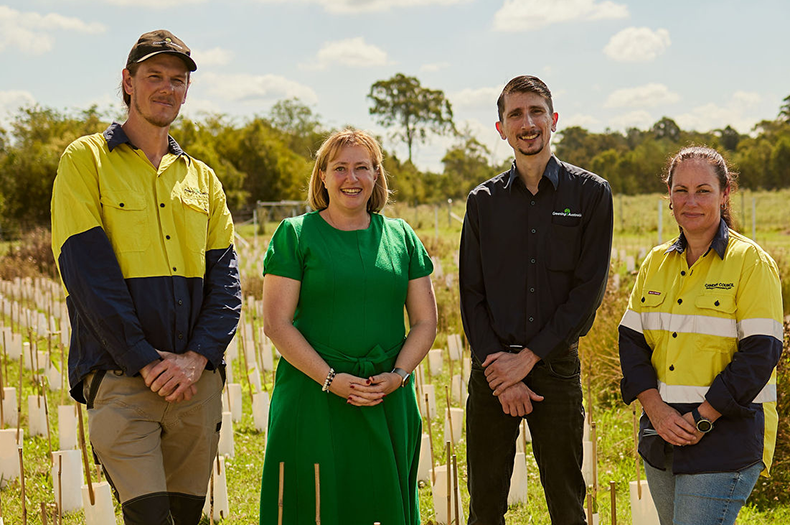 A posed group shot of Greening Australia representatives, Member for Camden and Camden Council representative.